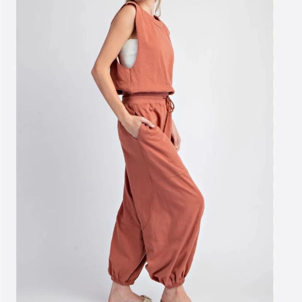 free people movement miss me yet oversized jumpsuit M Medium Orange Open Back